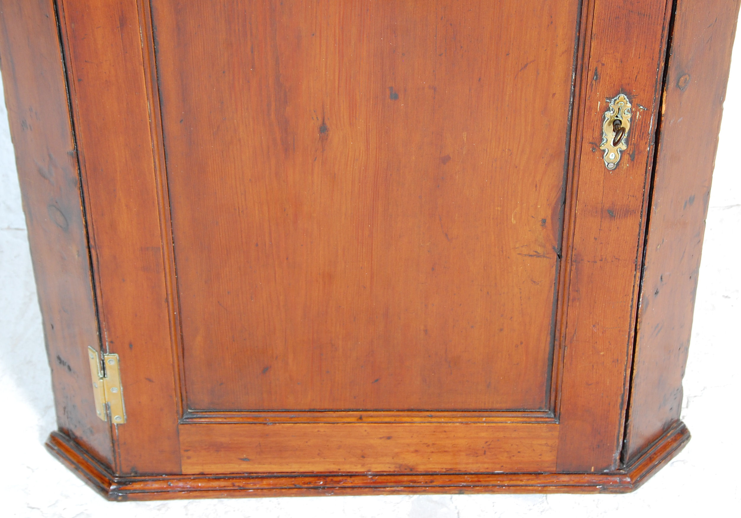 A 19th Century Georgian  / George III country pine hanging corner cabinet having a panelled door - Image 3 of 4