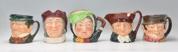 A group of five Royal Doulton character jugs to include Old Charley, Sam Weller and three other