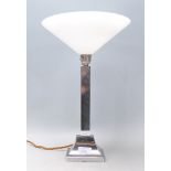 A good vintage 20th Century Art Deco chrome table lamp raised on a stepped base having a white glass