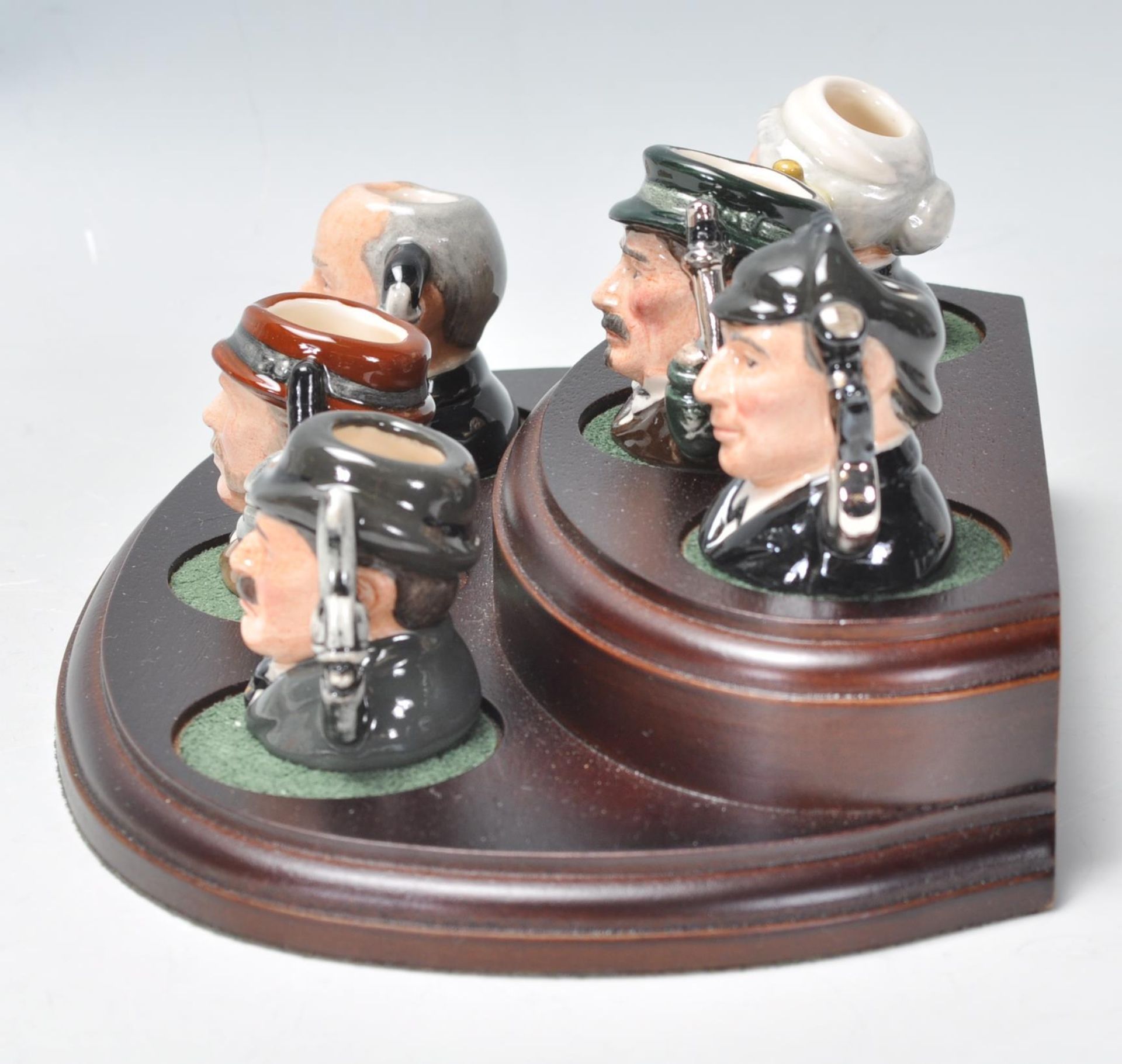 A group of six Royal Doulton miniature character jugs from the Sherlock Holmes Tinies collection - Bild 5 aus 8