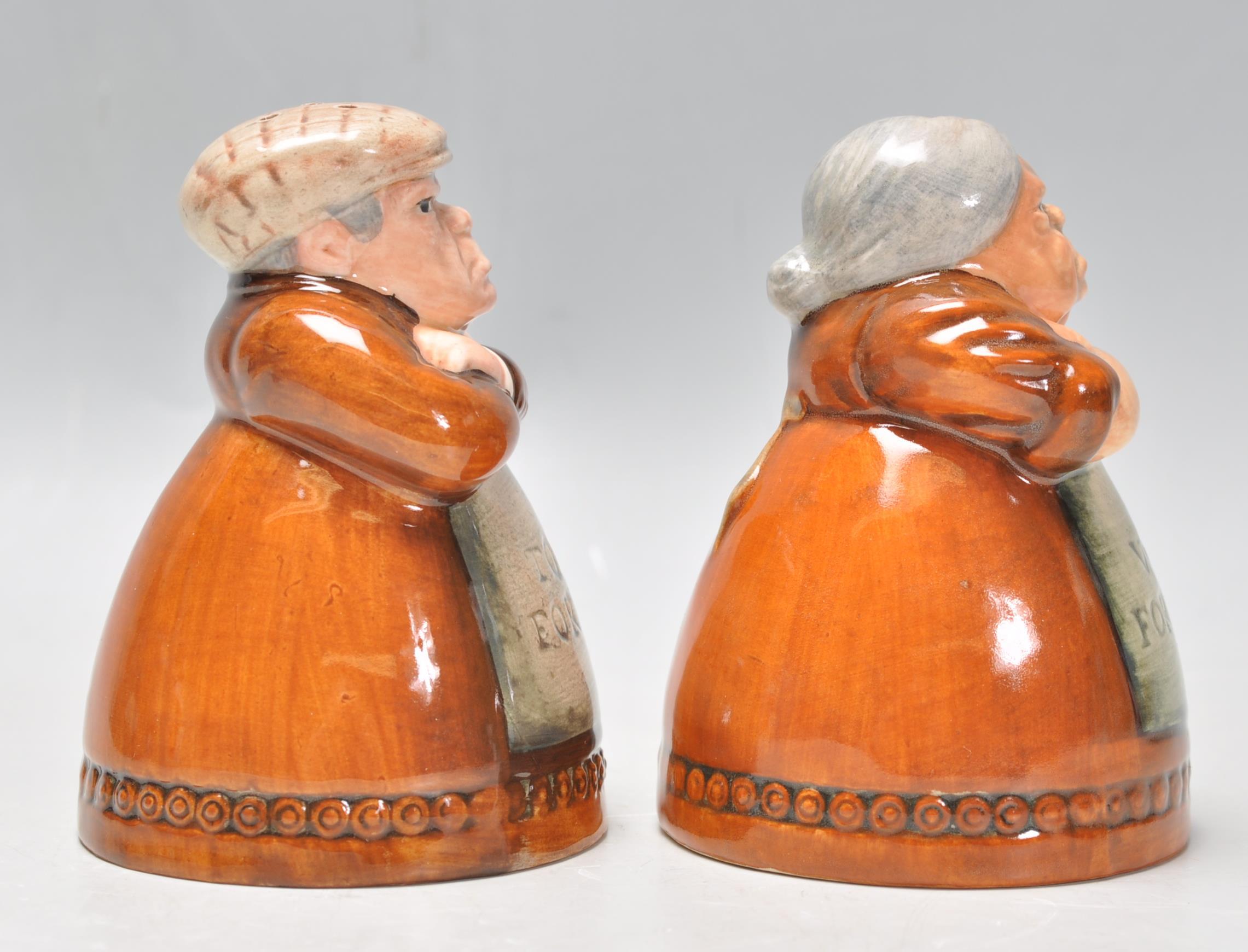 A pair of Royal Doulton salt and pepper pots entitled 'Votes for Women' and 'Toil for Men', D7066 - Image 3 of 6
