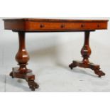 An early 19th Century rosewood writing table / desk having a rectangular top with twin drawers