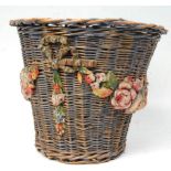 A 20th Century antique woven wicker basket of tapering cylindrical form having painted barbola
