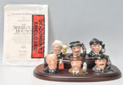 A group of six Royal Doulton miniature character jugs from the Sherlock Holmes Tinies collection