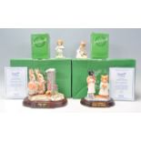 A good group of four Beswick Beatrix Potter porcelain figures to include Hiding From The Cat 63/3500