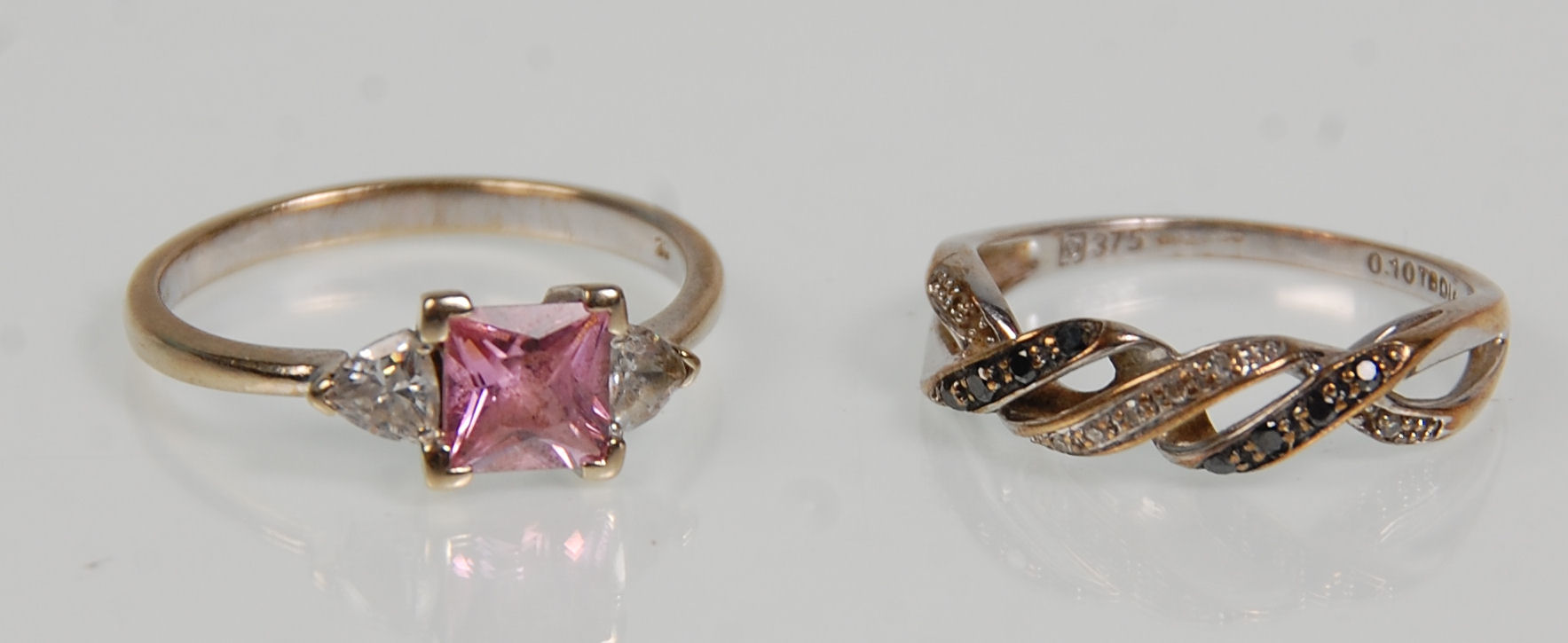 Two 9ct white gold ladies rings. One set with a square cut pink stone flanked by CZs. Hallmarked for - Image 6 of 14