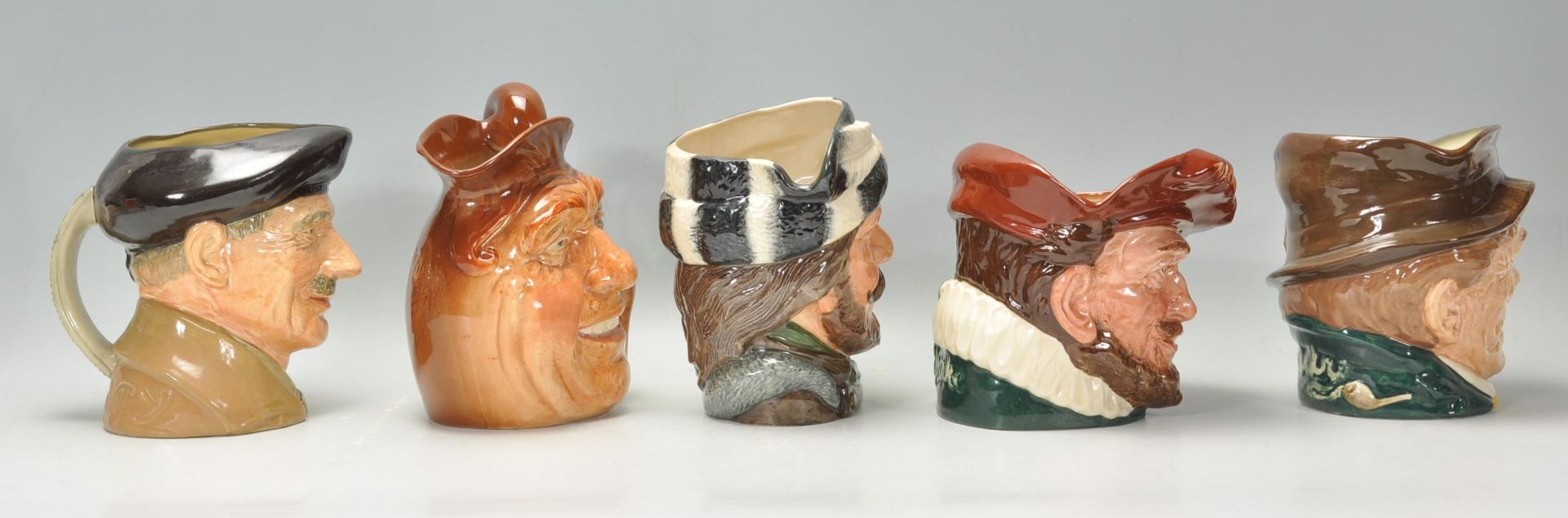 A group of five Royal Doulton character jugs to include The Trapper D6609, Monty D6202, Paddy, and - Bild 2 aus 10