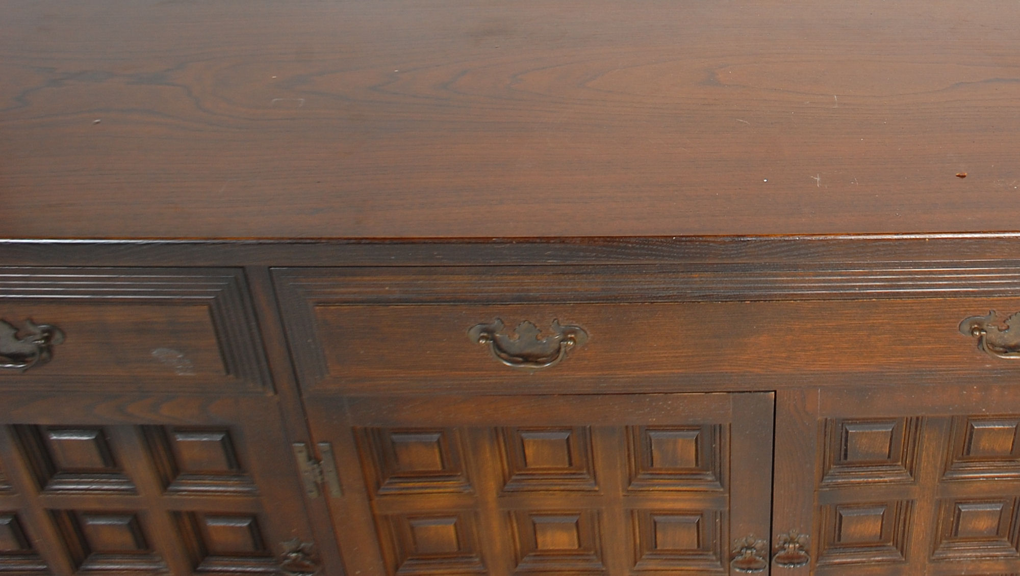 A mid century Spanish influence large carved oak sideboard / dresser base with portcullis relief - Image 2 of 9