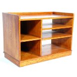 An 20th Century oak office storage unit / entertainment unit having a gallery top with sectional