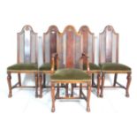 A set of five 1920's Art Deco dining chairs each having elongated back rests with canes panels and