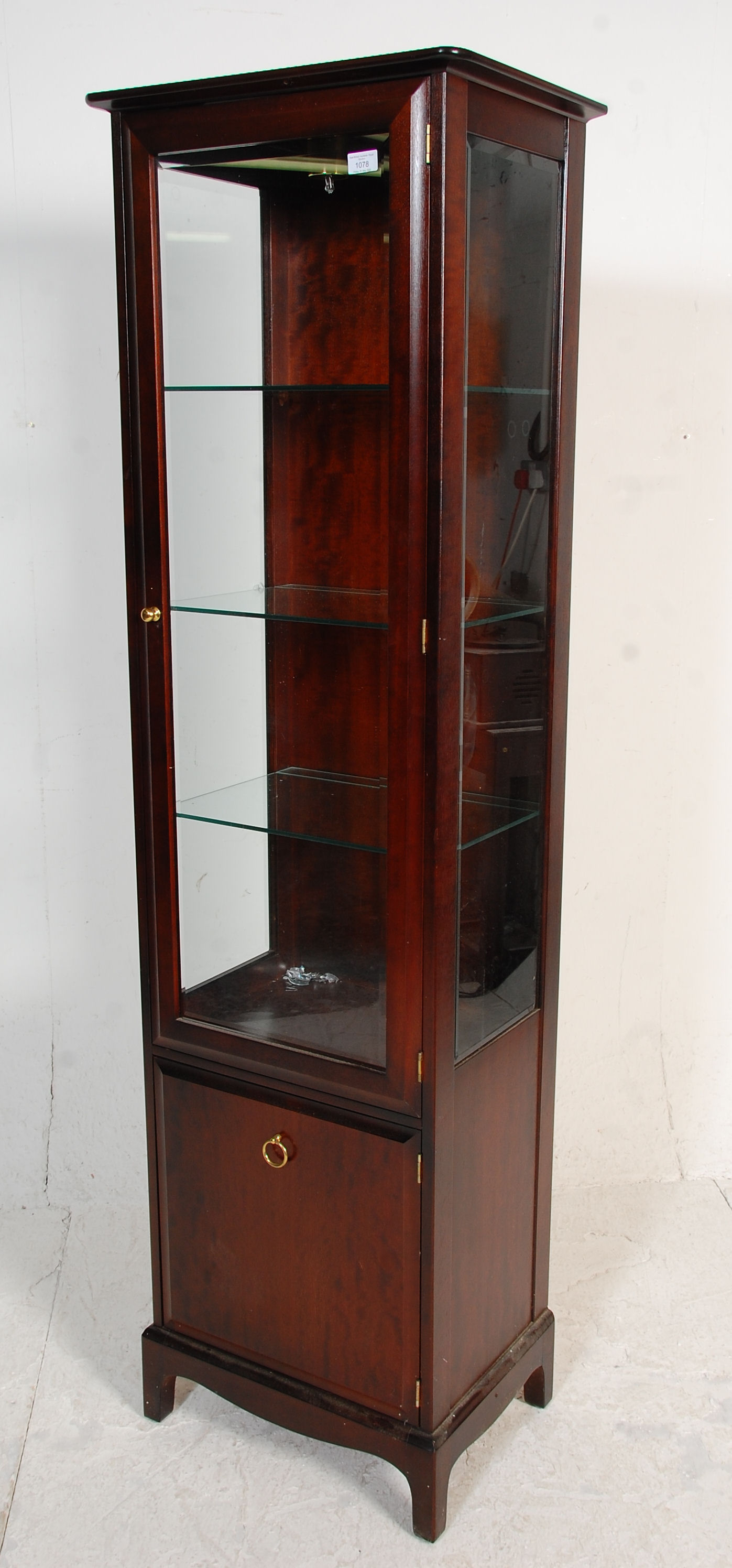 A 20th Century mahogany stag minstrel display cabinet having a cupboard base with ring handle to the - Image 4 of 5