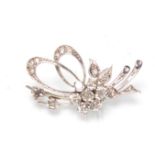 A stunning vintage mid 20th Century platinum and diamond brooch in the form of a floral bouquet
