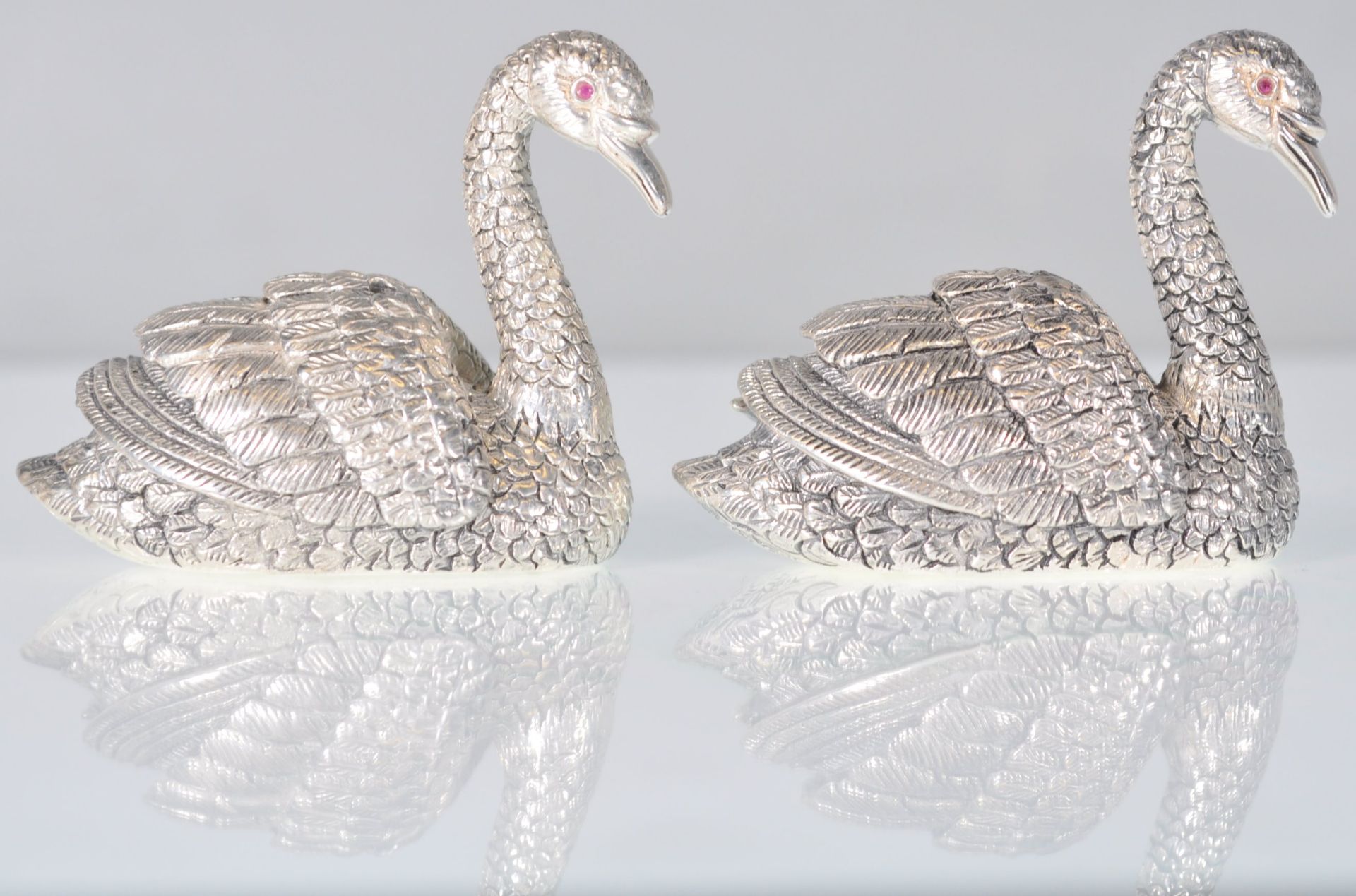 A pair of stamped 925 silver condiments in the form of swans having raised details and set with - Image 3 of 6