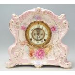 A 19th Century Victorian large Royal Bonn porcelain cased mantel clock of scrolled form with pink