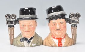 Laurel & Hardy - Two Royal Doulton ceramic Character / Toby jugs one of Stan Laurel D7008 and Oliver