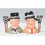 Laurel & Hardy - Two Royal Doulton ceramic Character / Toby jugs one of Stan Laurel D7008 and Oliver