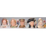 A group of five Royal Doulton character jugs to include Queen Elizabeth I D7180, Oscar Wilde