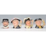 A group of four Royal Doulton ceramic Character / Toby jugs to include Beefeater D6206, Pearly Queen