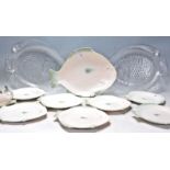 A set of vintage retro Shorter & Son fish plates having a white ground with mint green accents,