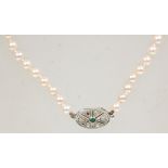 A good vintage cultured pearl necklace having a single strand of graduating pearls on a white gold