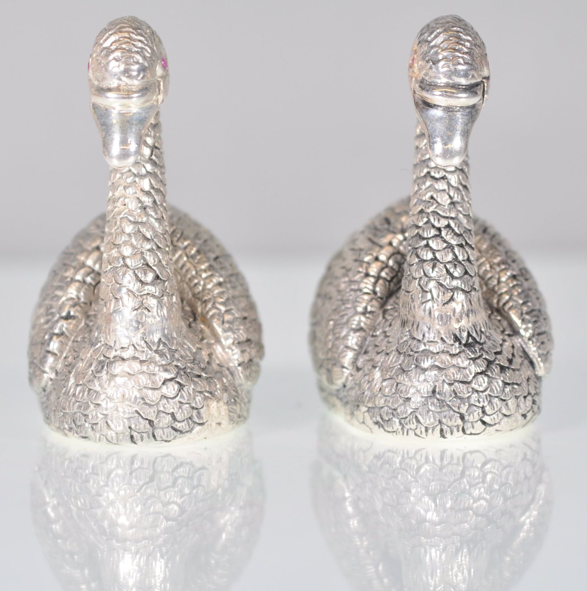 A pair of stamped 925 silver condiments in the form of swans having raised details and set with - Image 2 of 6
