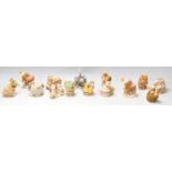 A group of fourteen Harmony Kingdom resin novelty figurines to include an elephant box, a lion and a