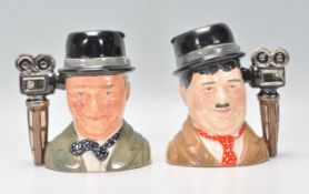 Laurel & Hardy - Two Royal Doulton ceramic Character / Toby jugs one of Stan Laurel D7008 and Oliver