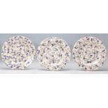 A group of three Emma Bridge water ceramic dinner plates each being hand painted with Scottish