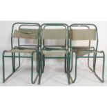 A group of six 20th Century vintage industrial military style tubular framed chairs having green