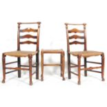 A pair of 19th Century Victorian hall / dining chairs being oak framed with rush seats, having