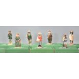 A group of seven Beswick ceramic figurines to include Huntsman Fox, the Lady Pig, Fisherman Otter,