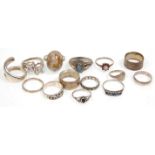A group of fourteen silver ladies rings of varying sizes and designs to included three bands,