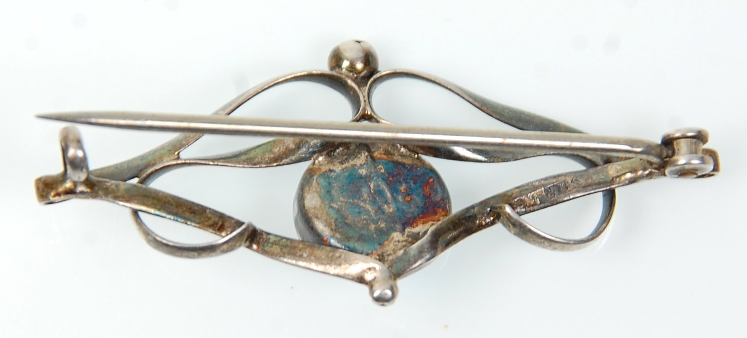 An early 20th Century Art Nouveau silver brooch set with a central opal panel within an openwork - Image 4 of 4