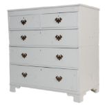 A Victorian painted pine 2 over 3 chest of drawers being raised on bracket feet with 2 short over