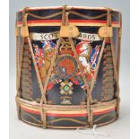 A 20th Century vintage military related ice bucket in the form of a drum having a black