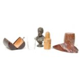 A collection of antique treen ware to include a turned olive wood dice shaker, a cast bronze bust of