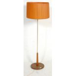 A vintage retro 1970's standard lamp having a round dark wood base with a chromed column with an