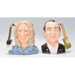 A pair of Royal Doulton Status Quo character jugs to include Rick Parfitt D6962, Francis Rossi