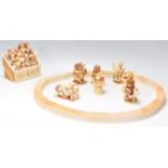 A group of Harmony Kingdom resin figurines in the form of a circus ring with spectators and