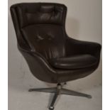 A retro mid century swivel egg chair  having a 4 p