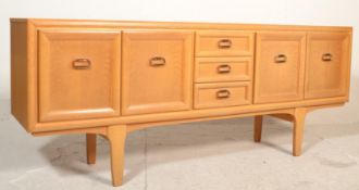 A retro mid century teak wood sideboard credenza.