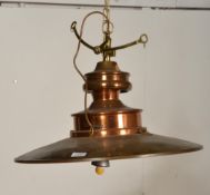 A large industrial factory style pendant lamp of m