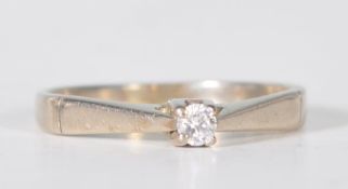 A 14ct white gold and diamond solitaire ring. Mark
