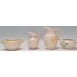 A group of four Belleek small vessels, all being l