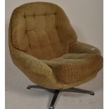 A retro mid century swivel egg chair  having a 4 p