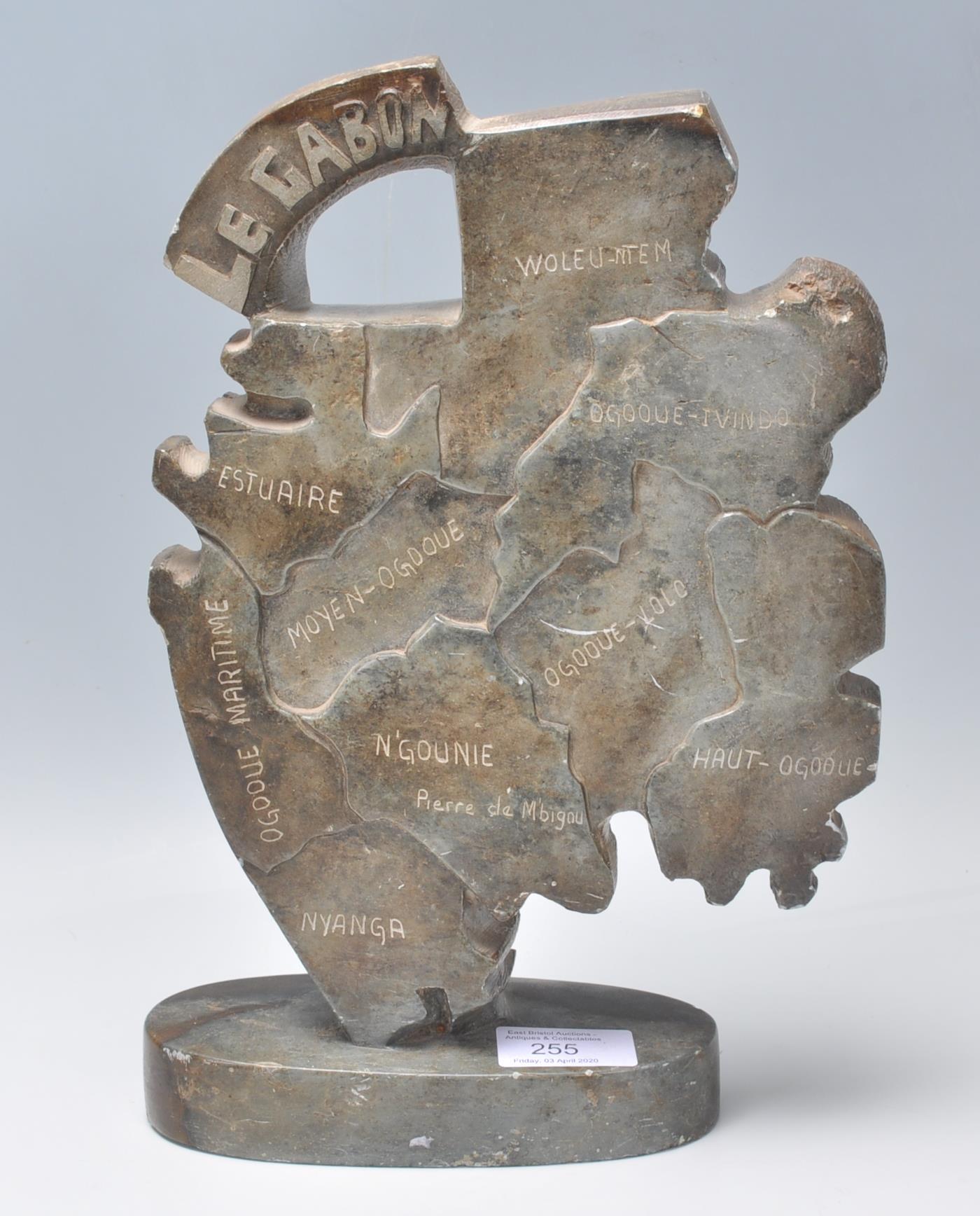 A carved soapstone map of the African country Le G