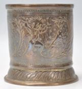 A vintage 20th Century Indian brass brush pot of c