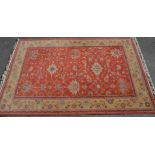 A vintage 20th Century machine woven Persian floor