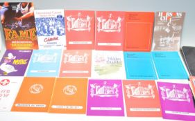 A collection of theater programs spanning various