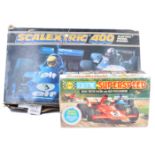 TWO VINTAGE SCALEXTRIC SLOT CAR SETS